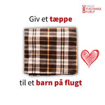 Giv et tæppe til et barn på flugt